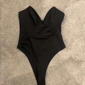 Strapless boned v cut body suit